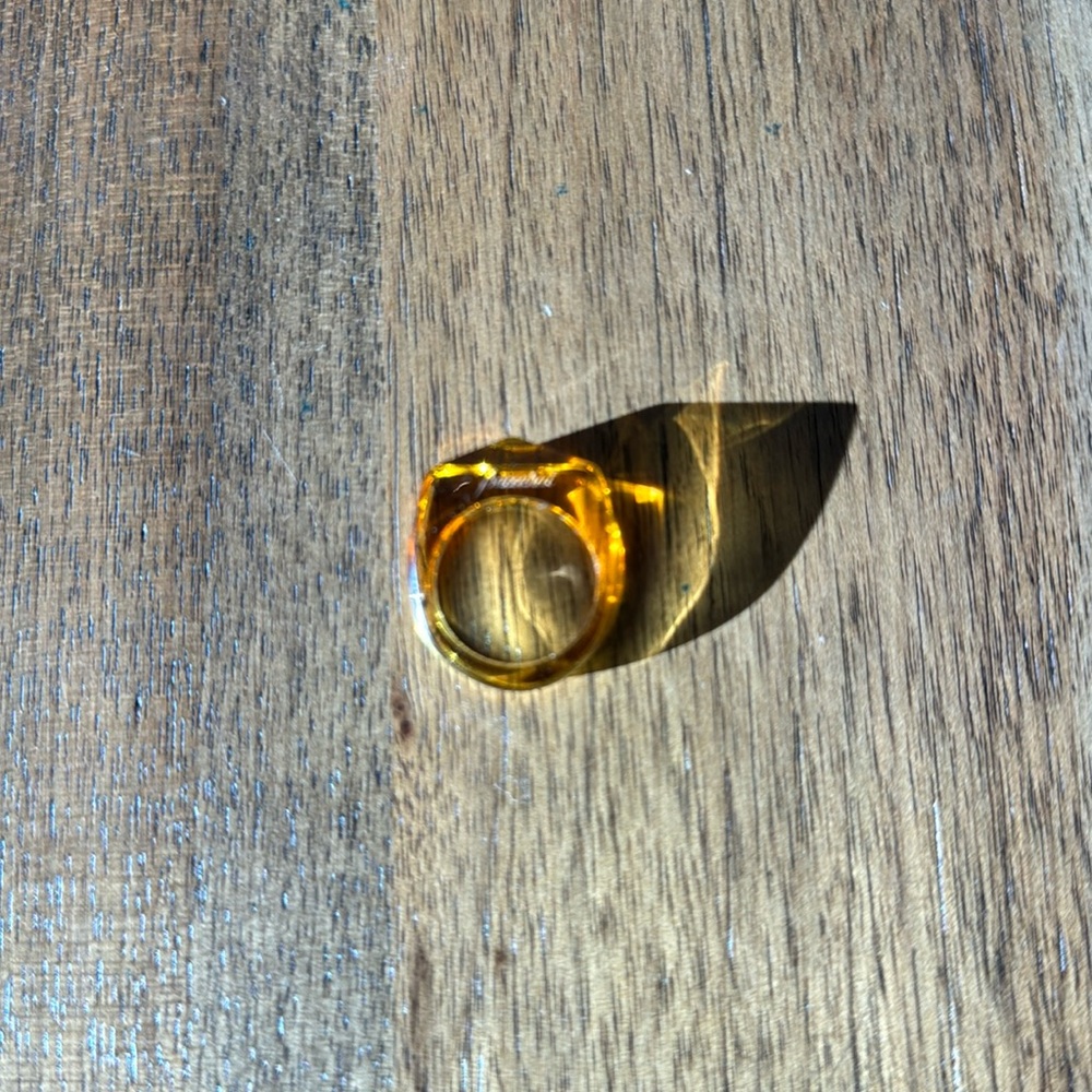 Baccarat faceted crystal ring in clear amber yellow color